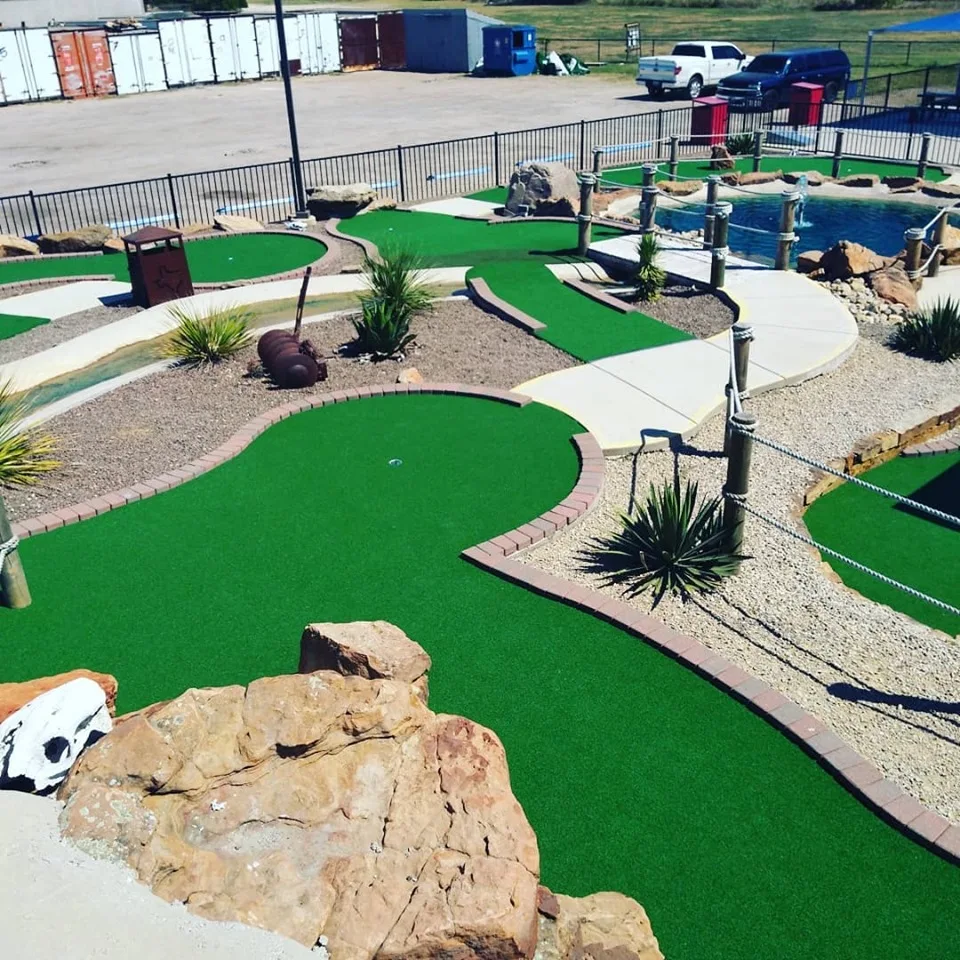 Mini golf greens with rock features